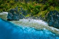 Aerial view of beautiful tropical limestone rocks, blue ocean and coral reef edge at El Nido, Palawan, Philippines Royalty Free Stock Photo
