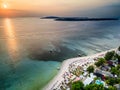 Aerial view of a beautiful tropical sunset and sandy beach resort (Gili Islands, Indonesia Royalty Free Stock Photo