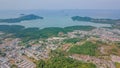 Aerial view of beautiful tropical town with trees and buildings near ocean in Thailand. Landscape.Asia. Drone. Royalty Free Stock Photo