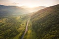 Aerial view of the beautiful wooded Carpathian mountains, amazing sunny landscape