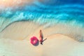 Aerial view of lying woman with swim ring near the sea Royalty Free Stock Photo