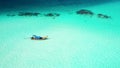 Aerial view of the beautiful young woman sea Water play with waves at Crystal clear water. Summer holiday idy Royalty Free Stock Photo