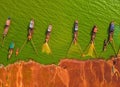 Aerial view of Ben Nom fishing village, a brilliant, fresh, green image of the green algae season on Tri An lake, with many Royalty Free Stock Photo