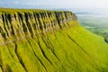 Aerial view of Benbulbin, aka Benbulben or Ben Bulben, iconic landmark, flat-topped nunatak rock formation. Magnificent costal Royalty Free Stock Photo