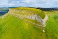 Aerial view of Benbulbin, aka Benbulben or Ben Bulben, iconic landmark, flat-topped nunatak rock formation. Magnificent costal