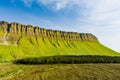 Aerial view of Benbulbin, aka Benbulben or Ben Bulben, iconic landmark, flat-topped nunatak rock formation. Magnificent costal Royalty Free Stock Photo