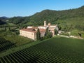 Aerial view of Abbazia di Praglia Italian Benedictine monastery in green vineyard hill landscape Royalty Free Stock Photo