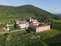 Aerial view of Abbazia di Praglia Italian Benedictine monastery in green vineyard hill landscape Royalty Free Stock Photo