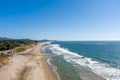 Aerial view of Beverly Beach and the Yaquina Head Lighthouse in Oregon. Royalty Free Stock Photo