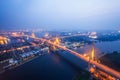 Aerial view of Bhumibol Suspension Bridges and highways interchange over the Chao Phraya River at dusk. Samut Prakan, Thailand Royalty Free Stock Photo