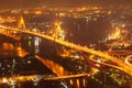 Aerial view of Bhumibol Suspension Bridges and highways interchange over the Chao Phraya River at dusk. Samut Prakan, Thailand Royalty Free Stock Photo