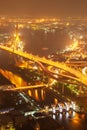 Aerial view of Bhumibol Suspension Bridges and highways interchange over the Chao Phraya River at dusk. Samut Prakan, Thailand Royalty Free Stock Photo