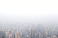 Aerial view of big city with air pollution / smog causing low vi Royalty Free Stock Photo