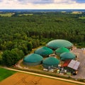 Aerial view of a biogas plant with silage piles and digesters for the production of methane gas