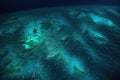aerial view of bioluminescent waves creating patterns in the ocean