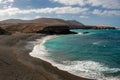 Aerial view of Black Sandy Beach, Coast of Atlantic Ocean and Cliffs in Ajuy, Furteventura, Canary Islands, Spain