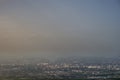 Aerial view of black smoke above city. Almaty city air pollution problems concept.