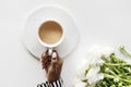 Aerial view of black woman drinks coffee on white table