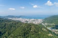 Aerial view blue ocean and blue sky with mountain in the foreground at Patong Bay of Phuket Thailand Landscape of patong city Royalty Free Stock Photo