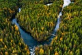 Aerial view of blue rivers and lakes in beautiful orange and red autumn forest, Finland Royalty Free Stock Photo