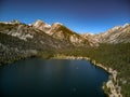 Aerial, drone view of blue sky and capped mountains over Twin Lakes Royalty Free Stock Photo