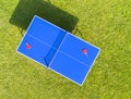 Aerial view blue table tennis or ping pong. Close-up ping-pong net. Close up ping pong net and line. Top view two table tennis or Royalty Free Stock Photo