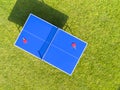 Aerial view blue table tennis or ping pong. Close-up ping-pong net. Close up ping pong net and line. Top view two table tennis or Royalty Free Stock Photo