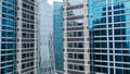 Aerial view of blue windows building reflecting skyscrapers around Jakarta city Royalty Free Stock Photo