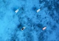 Aerial view of the boat in clear blue water at sunny day Royalty Free Stock Photo