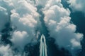 aerial view of boat navigating a pathway through towering cumulus formations