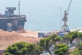 Aerial view of boat in the process of unloading wood chips carrier to the port of Setubal