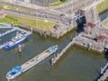 Aerial view of a boat sailing through a canal Royalty Free Stock Photo