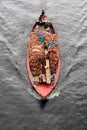Aerial View of Boat Transporting Bricks on Calm Waters with Workers Royalty Free Stock Photo