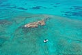 Aerial view of boats anchored off coral islet off North Bimini, Bahamas. Royalty Free Stock Photo