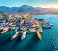 Aerial view of boats and beautiful architecture at sunset