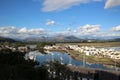 an aerial view of boats docked along the waterfront in front of houses Royalty Free Stock Photo