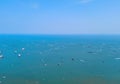 Aerial view of boats in Pattaya sea, beach with blue sky for travel background. Chonburi, Thailand