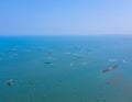 Aerial view of boats in Pattaya sea, beach with blue sky for travel background. Chonburi, Thailand