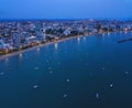 Aerial view of boats in Pattaya sea, beach at night, and urban city with blue sky for travel background. Chon buri Province, Royalty Free Stock Photo