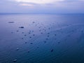 Aerial view of boats in Pattaya sea, beach with sunset sky for travel background. Chonburi, Thailand