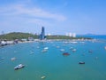 Aerial view of boats in Pattaya sea, beach, and urban city with blue sky for travel background. Chonburi, Thailand Royalty Free Stock Photo