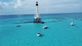 Aerial view of boats sailing in the vicinity of Crocodile Reef Lighthouse in the United States