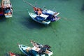 Aerial view boats at the turquoise sea in Vietnam