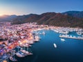 Aerial view of boats and yachts and beautiful city at sunset Royalty Free Stock Photo