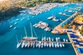 Aerial view of boats and yachts in dock at sunset in summer