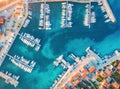 Aerial view of boats and yachts in port in old city at sunset Royalty Free Stock Photo