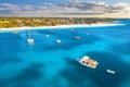 Aerial view of boats and yachts on the tropical sea coast Royalty Free Stock Photo
