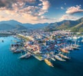 Aerial view of boats and yahts and beautiful city at sunset Royalty Free Stock Photo