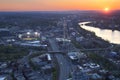 Aerial view of Boston sunset with Red Sox Stadium Fenway Park lighted and Charles river