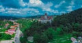 Aerial view of Bran castle or famous Dracula's castle, close to Bran, Romania on a cloudy summer day